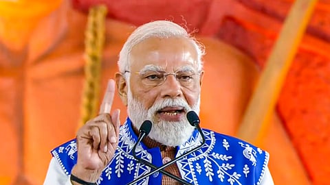 In this screengrab from a video posted on Nov. 15, 2025, Prime Minister Narendra Modi speaks during the 'Janjatiya Gaurav Diwas' programme, in Dediapada, Gujarat.