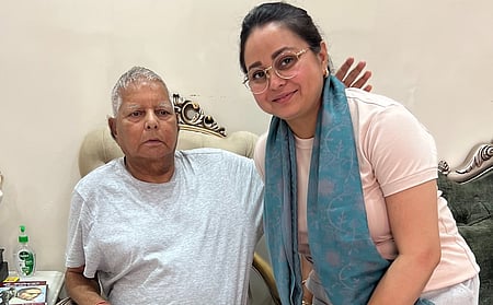 Rohini Acharya with father and RJD supremo Lalu Prasad Yadav.