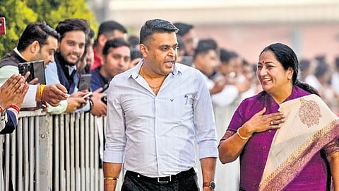CM Rekha Gupta greets supporters after NDA’s win at BJP headquarters.
