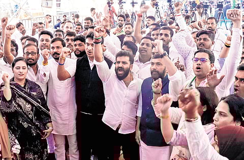 Youth Congress members led by MLC Saleem Ahmed protest against what they called ‘Vote Chori’ by BJP, at Freedom Park in Bengaluru on Saturday 
