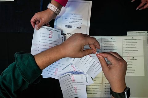 Supporters of presidential candidate Jeannette Jara of the Unidad por Chile coalition watch results come in during general elections in Santiago, Chile, Sunday, Nov. 16, 2025