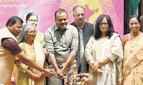 Assembly Speaker UT Khader, along with Karnataka Madhyama Academy president Ayesha Khanam inaugurates the Press Day event in Bengaluru on Monday.