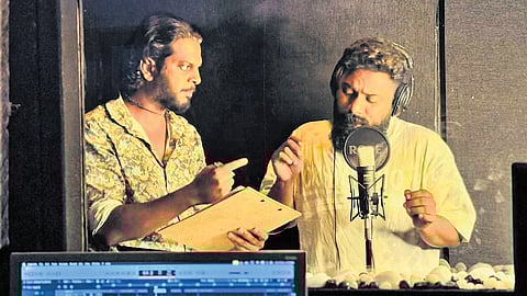 Akshay and Sajeer recording poll parody tracks in a studio at Manjeri in Malappuram