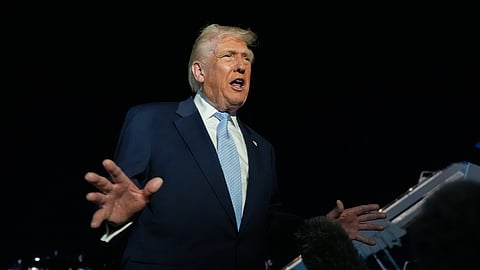 US President Donald Trump speaks to reporters before boarding Air Force One at Palm Beach International Airport in West Palm Beach Fla., on his way back to the White House, Sunday, Nov. 16, 2025.