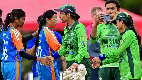 Pakistan's players (R) shake hands with India's players at the end of the Women’s Blind Twenty20 World Cup 2025 match between India and Pakistan at the BOI Cricket Stadium in Katunayake on November 16, 2025.