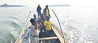 A protection camp team carrying out patrolling in the lagoon.