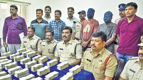 GRP DSP G Ratna Raju addressing a press conference over a train theft case in Vijayawada on Monday.