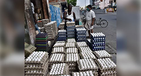 Residents shopping eggs at local market on Erukkanchery High Road at Vyasarpadi after four days complete lockdown to prevent Novel corona virus in Chennai.