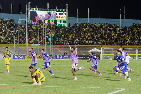 Curaçao players celebrate qualifying for the 2026 FIFA World Cup after a soccer match against Jamaica in Kingston, Jamaica, Tuesday, Nov. 18, 2025.