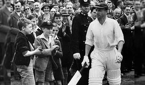 Australia's Travis Head celebrates his century on day two of the first Ashes cricket test match between Australia and England in Perth, Saturday, Nov. 22, 2025.