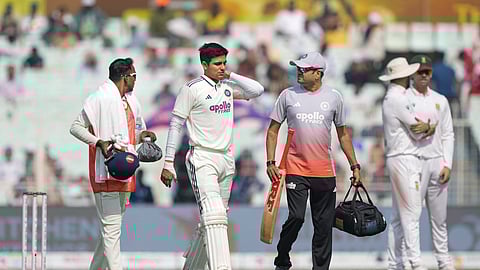 Shubman Gill walks off the field after being retired hurt during the second day of the first Test cricket match of a series between India and South Africa, at the Eden Gardens, in Kolkata, Saturday, Nov. 15, 2025.