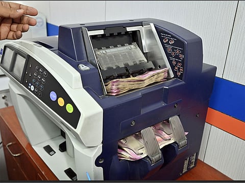 The dollar index, which gauges the greenback's strength against a basket of six currencies, was trading 0.13 per cent lower at 99.98.