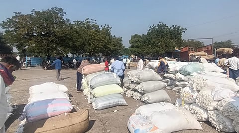 A huge quantity of cotton arrivals and purchased the private traders in the Enumamula Agricultural Market in Warangal.
