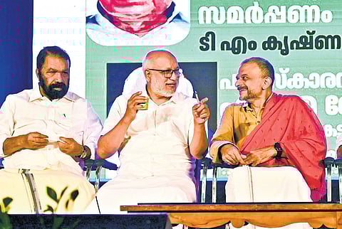 CPM general secretary M A Baby and P Govinda Pillai Memorial National Award winner T M Krishna at the award ceremony at University Senate Hall, Thiruvananthapuram, on Saturday. Education Minister V Sivankutty is 
also seen