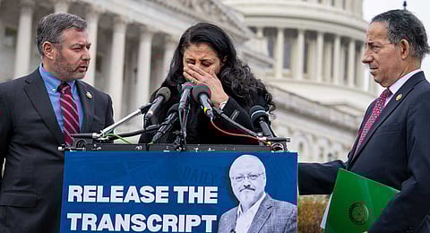 From left, Rep. Eugene Vindman, D-Va., Hanan El-Atr Khashoggi, the widow of slain journalist Jamal Khashoggi, and Rep. Jamie Raskin, D-Md., hold a news conference as they call on President Donald Trump to release the transcript of a call he had with Saudi Crown Prince Mohammed bin Salman after Khashoggi's killing, at the Capitol in Washington, Friday, Nov. 21, 2025.