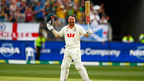 Australia's Travis Head celebrates his century on day two of the first Ashes cricket test match between Australia and England in Perth, Saturday, Nov. 22, 2025.