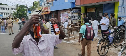 A consumer outside a Tasmac shop in  Tiruchy 