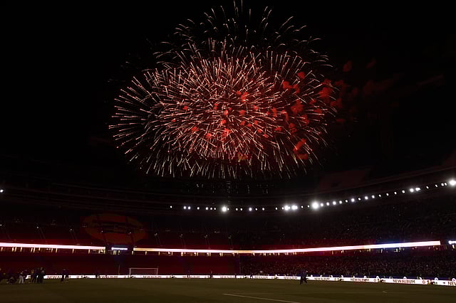 Fireworks are fired at the end of the Spanish league football match between FC Barcelona and Athletic Club Bilbao at Camp Nou Stadium in Barcelona on November 22, 2025.