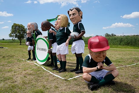 US, left, and Ukrainian, right, delegations at the beginning of their talks at the US Permanent Mission in Geneva, Switzerland, Sunday, Nov. 23, 2025.