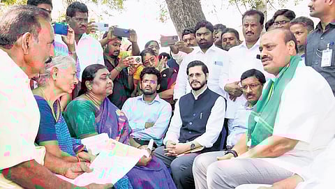 Agriculture Minister Atchannaidu interacting with farmers after inaugurating the state-wide Rythanna Meekosam initiative in Krishna district on Monday 