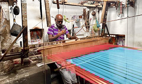 Seventy-year-old master weaver V S Marudhai continues to weave in Manamedu, even as the cluster struggles with a shrinking pool of artisans.