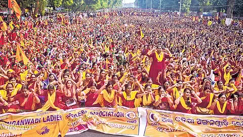 Anganwadi workers staging dharna at Lower PMG road on Monday 