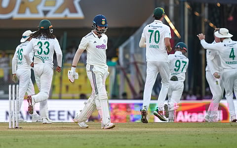 KL Rahul (C) walks back to the pavilion after being dismissed by Simon Harmer