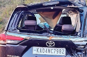 The mang-led remains of the car after the accident