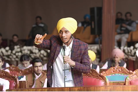 A student speaking at the mock Punjab Assembly session.