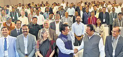 Agriculture Minister N Chaluvarayaswamy greets delegates during the international confrence on watershed resilience in Bengaluru on Wednesday.
