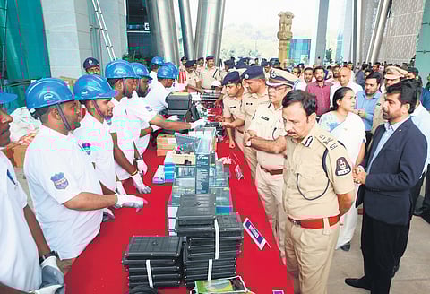 Hyderabad Police Commissioner VC Sajjanar inspects surveillance equipment during the launch of Advanced City Surveillance Grid Management Protocol & EYES teams.