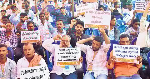 AICCTU members protest at Freedom Park in Bengaluru, demanding the repeal of the labour codes and abolition of the contract labour system, on Thursday