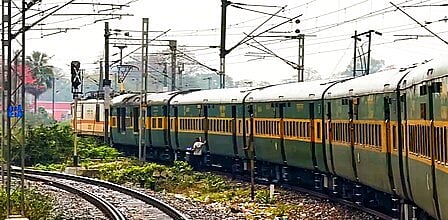 Narrow escape for passenger train as speeding truck falls on tracks from overbridge