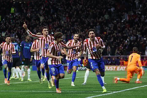 Atletico Madrid's Jose Gimenez (R) celebrates with teammates after scoring their second goal during the UEFA Champions League, league phase day 5 football match between Club Atletico de Madrid and Inter Milan on November 26, 2025.