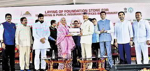 Union Finance Minister Nirmala Sitharaman takes part in the foundation stone laying ceremony of head offices of 15 banking and insurance institutions in Amaravati on Friday.