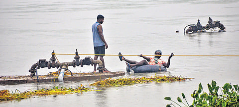Visitors at Marina Beach were seen venturing close to the shoreline on Friday, despite the rough tides triggered by Cyclone Ditwah, which is expected to make landfall near the Chennai coast 