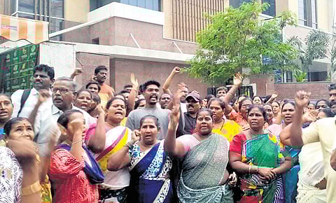 Over 30 workers staged a protest outside the Kilpauk Hospital on Saturday, demanding the CM’s direct intervention 