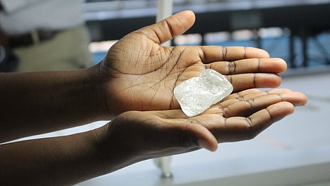 A raw diamond is displayed during a media tour of the Diamond Trading Company in Gaborone, Botswana, Sept. 16, 2025.