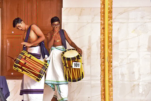 Students participating in the thayambaka competition engage in final rehearsals