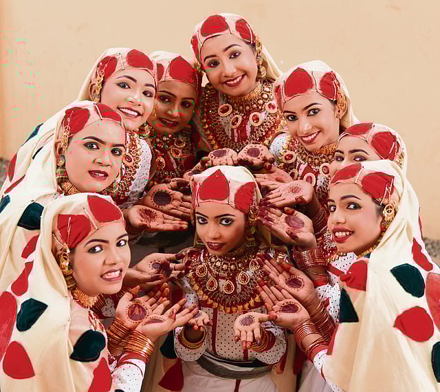 Students of GUPS Kummanode participating in the Oppana competition pose for a photograph