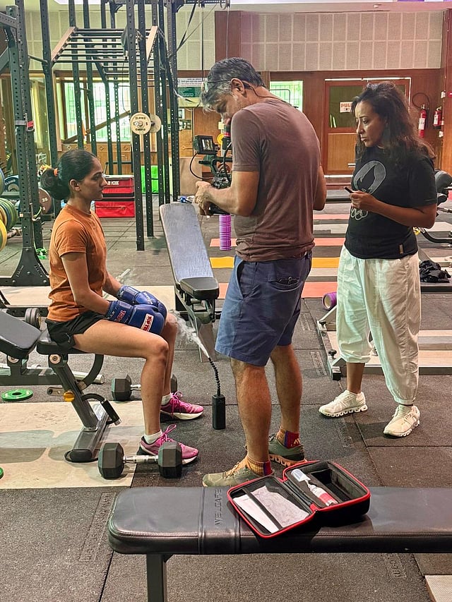 (Left) Parveen Hooda captured mid-practice