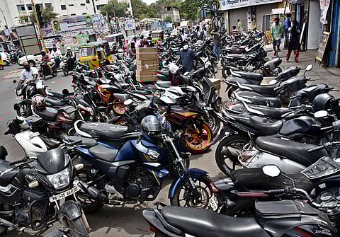 The vehicles of the shoppers at Ritchie Street Electronics Hub.
