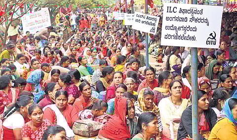 ASHA and Anganwadi workers, along with CITU members, protest at Freedom Park in Bengaluru on Monday