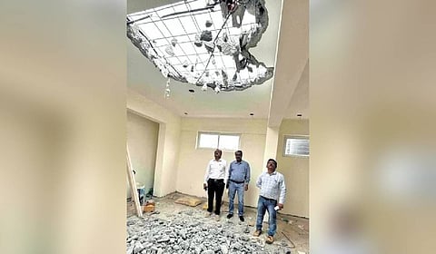 Bengaluru East City Corporation engineers monitor the demolition 
of an illegal floor in Whitefield.