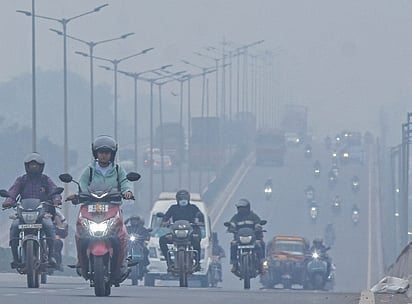 Commuters drive through smog on NH-16 with worsening air quality index in
Bhubaneswar 