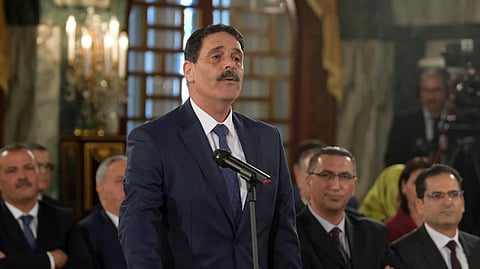 Ayachi Hammami, the Tunisian minister of human rights and relations, takes the oath of office during a swearing-in ceremony at the Carthage Palace outside the capital Tunis, Feb. 27, 2020. 