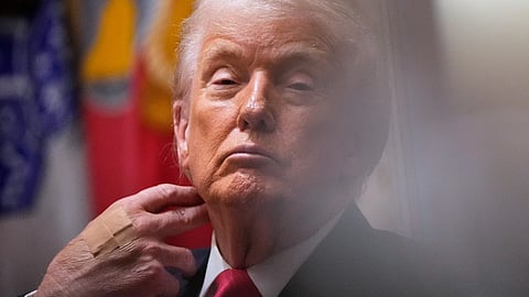 President Donald Trump listens during a Cabinet meeting at the White House, Tuesday, Dec. 2, 2025, in Washington.