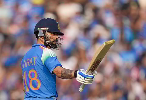 Virat Kohli celebrates his half century during the second ODI cricket match of a series between India and South Africa, at Shaheed Veer Narayan Singh International Stadium, in Raipur, Chhattisgarh, Wednesday, Dec. 3, 2025.