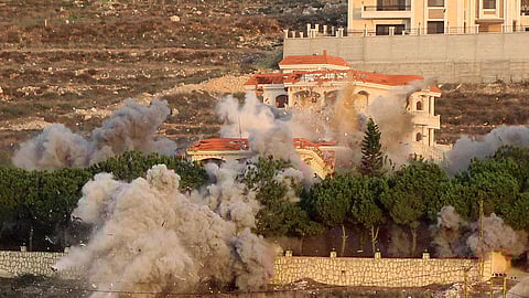 Smoke billows from the site of an Israeli airstrike that targeted the southern Lebanese village of al-Mjadel on December 4, 2025.