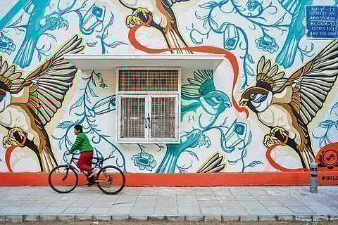 A mural featuring sparrows